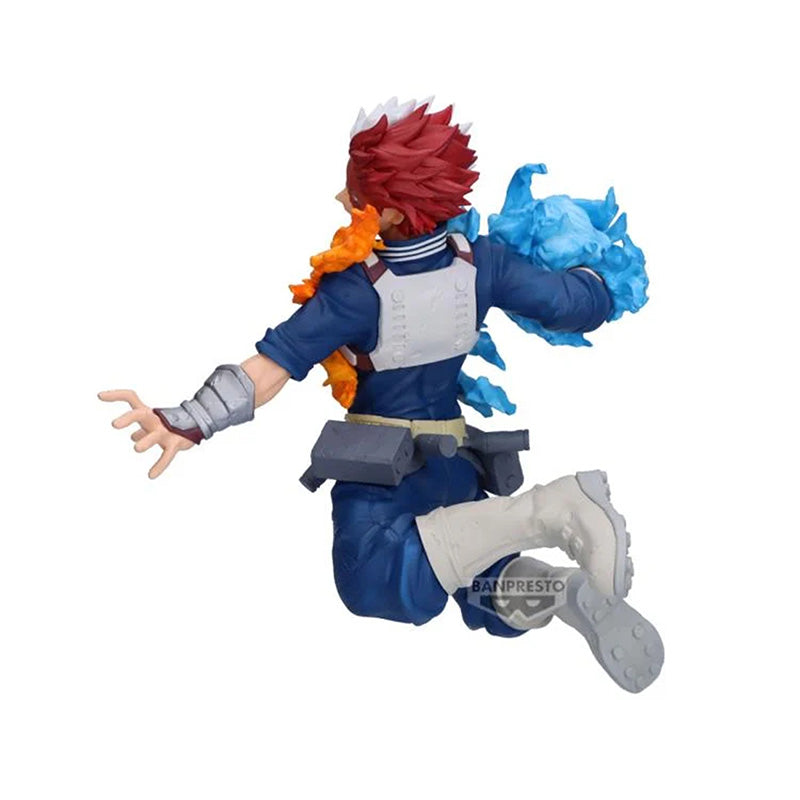 Side angle of Shoto Todoroki anime figure showing fire effect from left arm, detailed hero costume, posed on white background