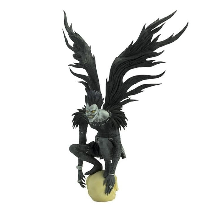 GG Anime Collectibles Death Note Ryuk statue, a dark winged creature crouching on a skull. Black wings, grey skin, yellow eyes.