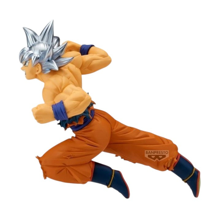 Right-side view of Banpresto Match Makers Goku figure showcasing battle-damaged gi and dynamic leaping pose